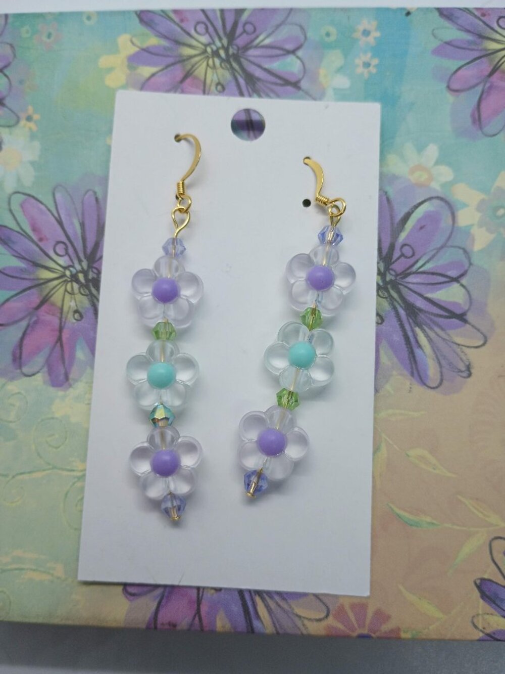 Dainty Daisy Chain Dangle Earrings Purple and Blue Centers in White Flowers